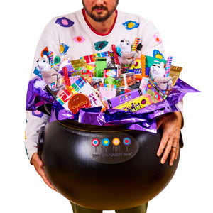 filled-with-a-spectacular-selection-of-100-sweets-that-are-perfect-for-trick-or-treaters-halloween-parties-and-more-this-preassembled-cauldron-is-the-ultimate-host-gift-spooky-centerpiece-more