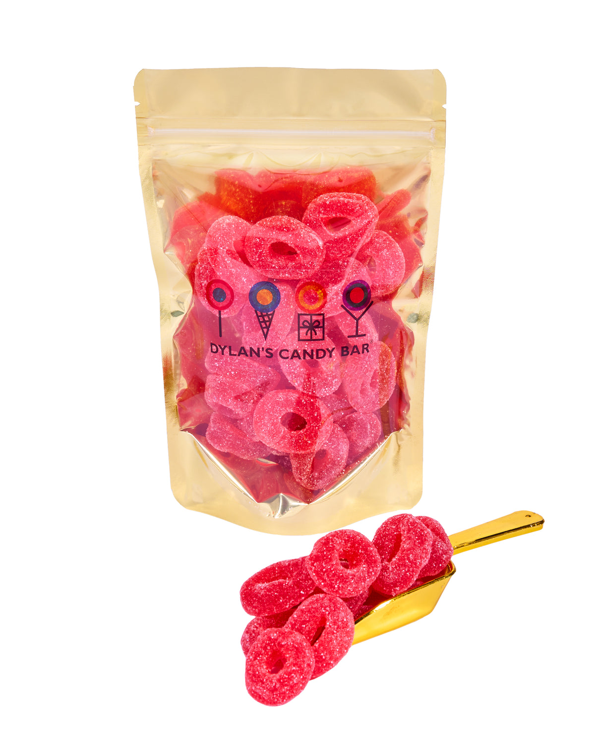Watermelon Gummy Rings in resealable gold mylar bag next to Watermelon Gummy Rings overflowing from gold scoop
