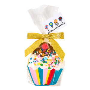 cupcake-shaped-cookie-decorated-with-frosting-and-sprinkles-and-ready-to-gift-with-cellophane-wrap-gold-glitter-ribbon-and-gift-tag
